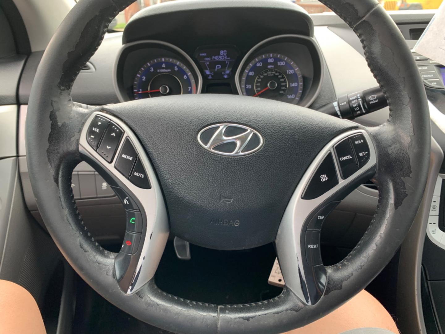 2012 Black Hyundai Elantra GLS A/T (KMHDH4AE3CU) with an 1.8L L4 DOHC 16V engine, Automatic transmission, located at 1830 North Belt Line Road, Irving, TX, 75061, (469) 524-0199, 32.834373, -96.993584 - Photo#11